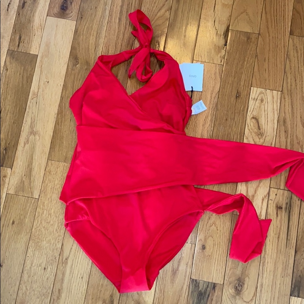 Brand new onia wrap one piece